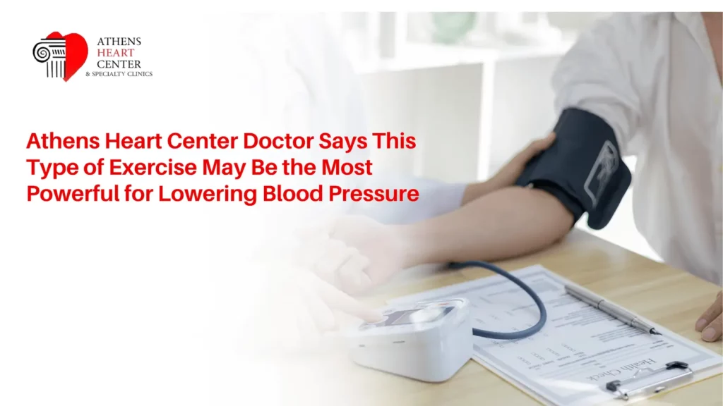 A physician from Athens Heart Center explains the best exercise to reduce high blood pressure to a patient during a clinical consultation, featuring a digital blood pressure monitor.