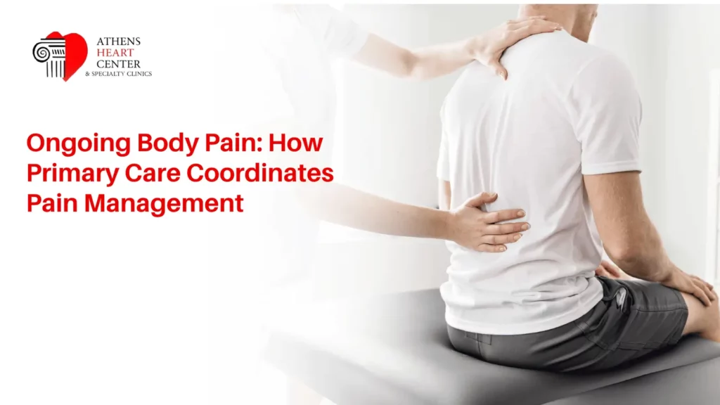 A medical professional evaluating a male patient's lower back during a chronic pain management assessment at Athens Heart Center.